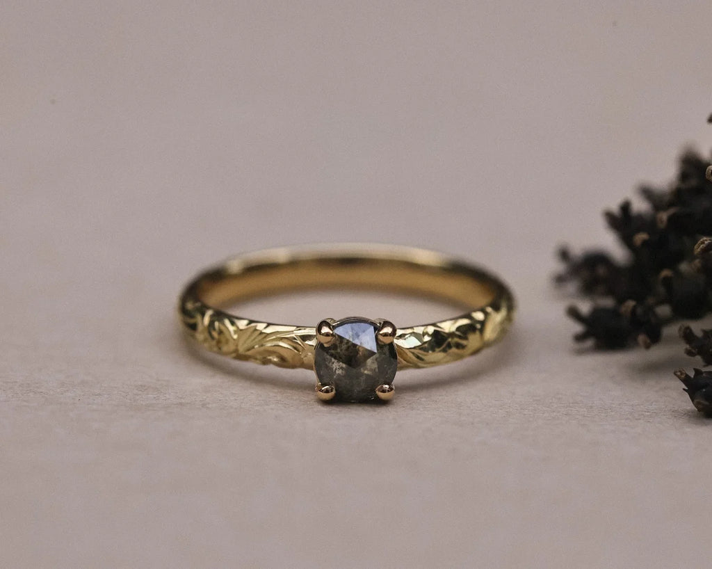 Low front view of 18ct yellow gold floral ring with grey rose-cut diamond