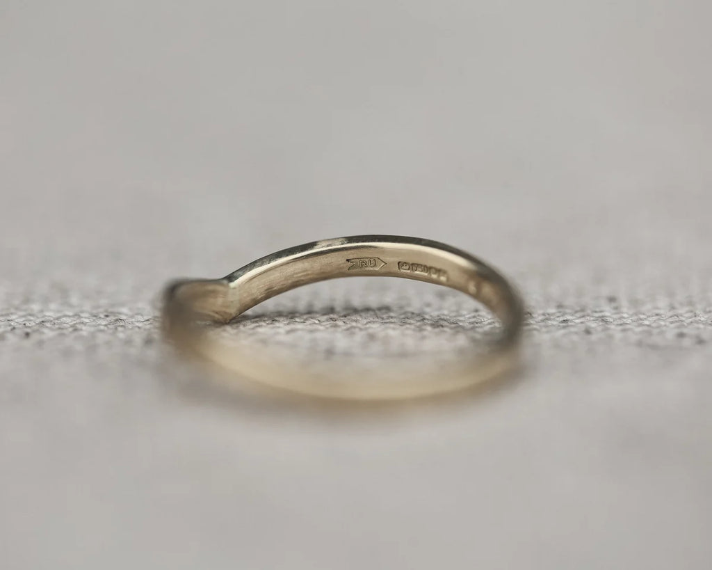 Back view of white gold wishbone wedding ring