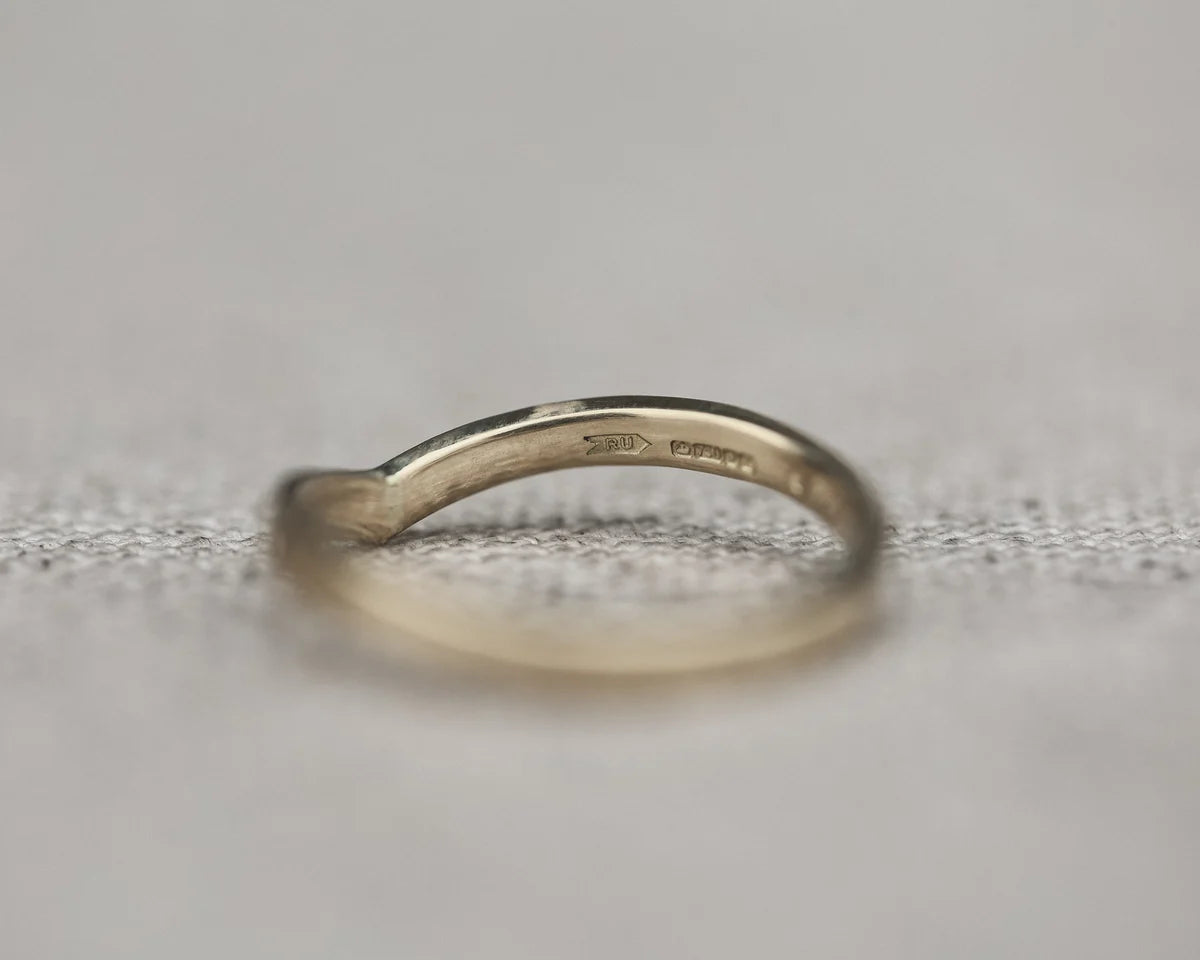 Back view of white gold wishbone wedding ring