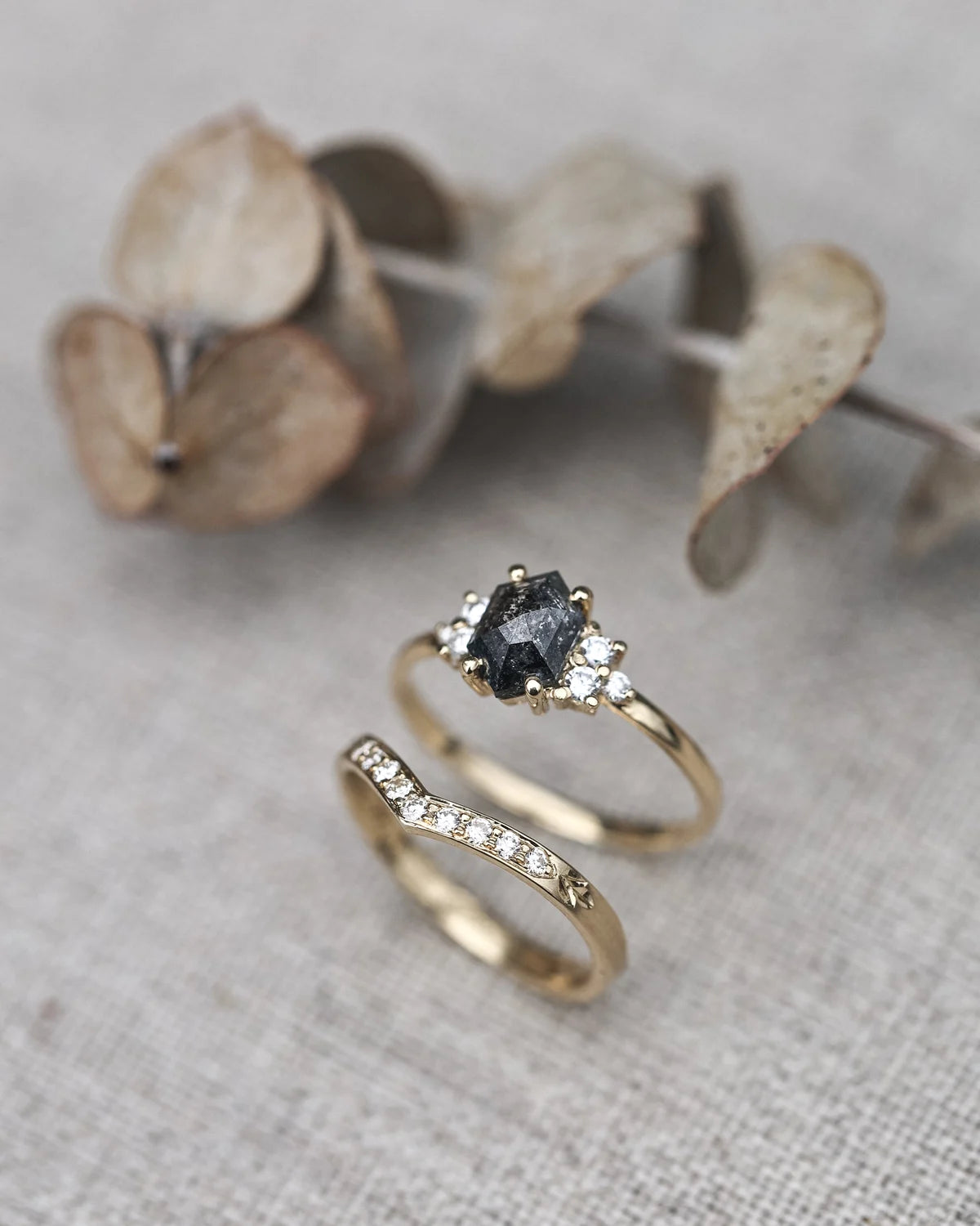 Diamond wishbone semi-eternity ring styled with rose-cut diamond ring