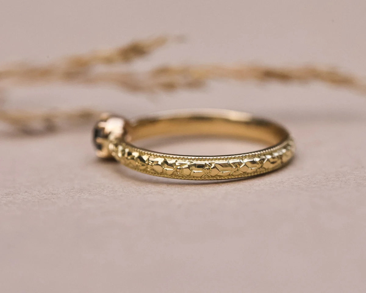 White gold version of orange blossom engraved ring with grey rose-cut diamond