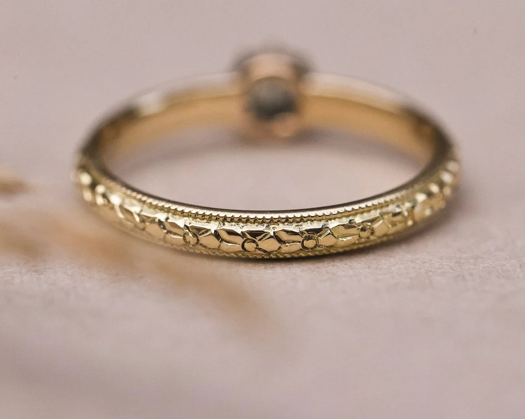 Back view of orange blossom engraved band in 18ct yellow gold