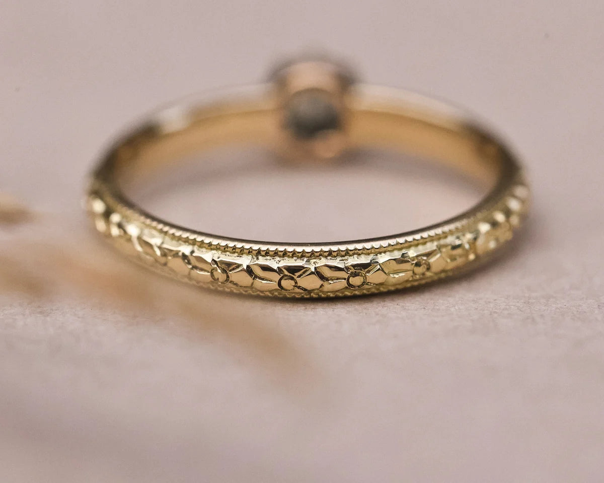 Back view of orange blossom engraved band in 18ct yellow gold