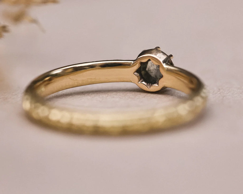 Back view of grey diamond setting on handmade gold ring