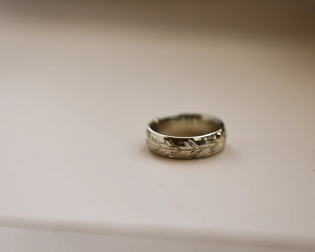 Minimal 6mm olive leaf engraved wedding ring in white gold