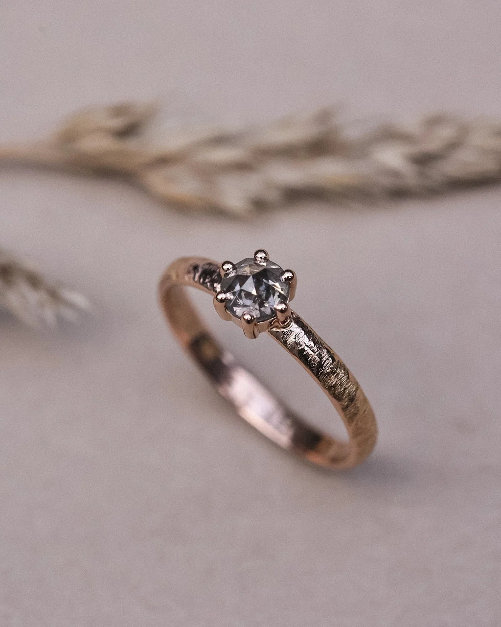 Side view of natural grey diamond ring in 18ct rose gold