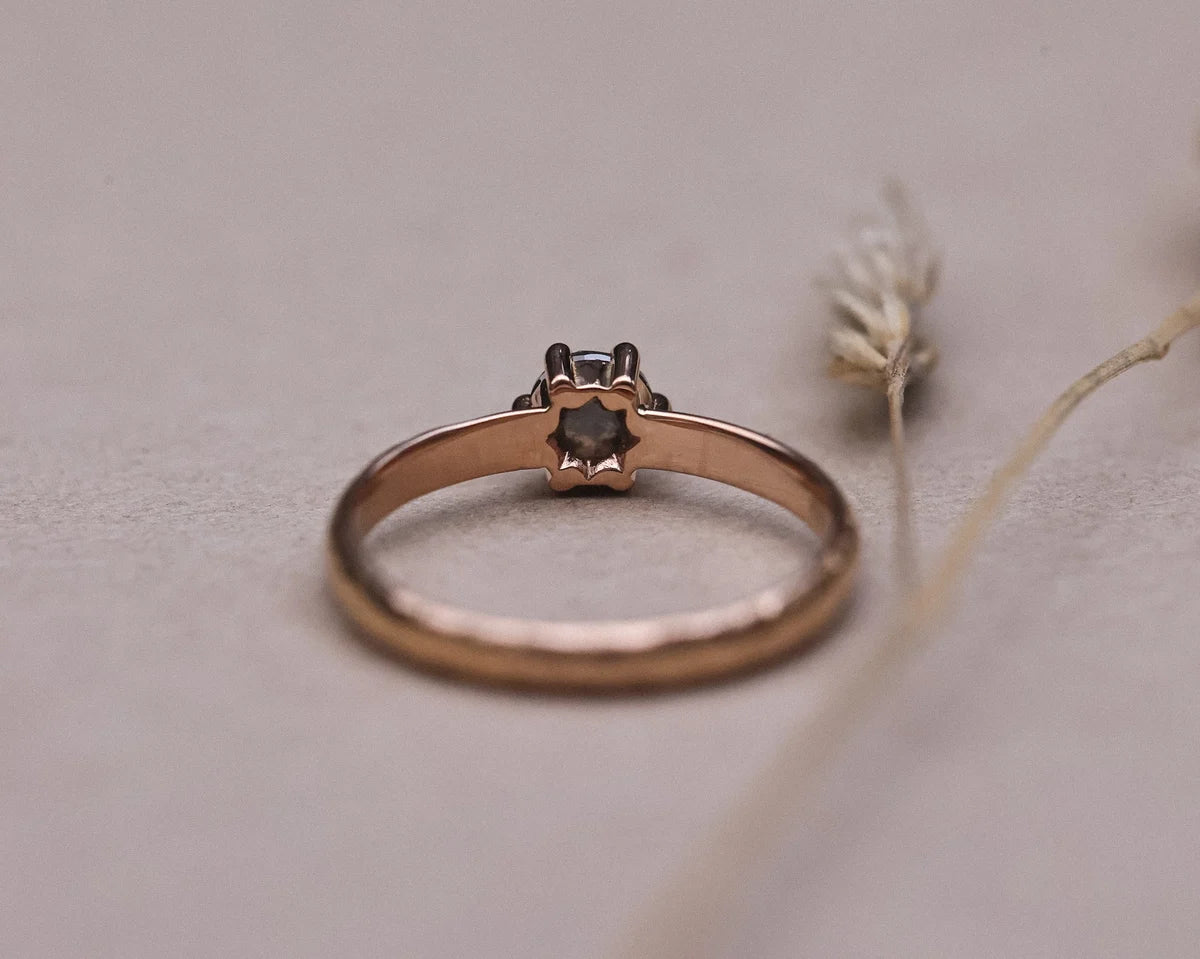 Back view of rose gold horn texture ring with diamond setting