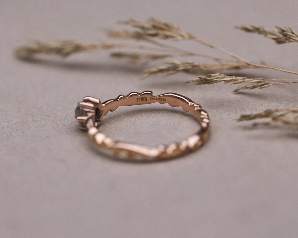 Back view of 18ct rose gold floral carved band