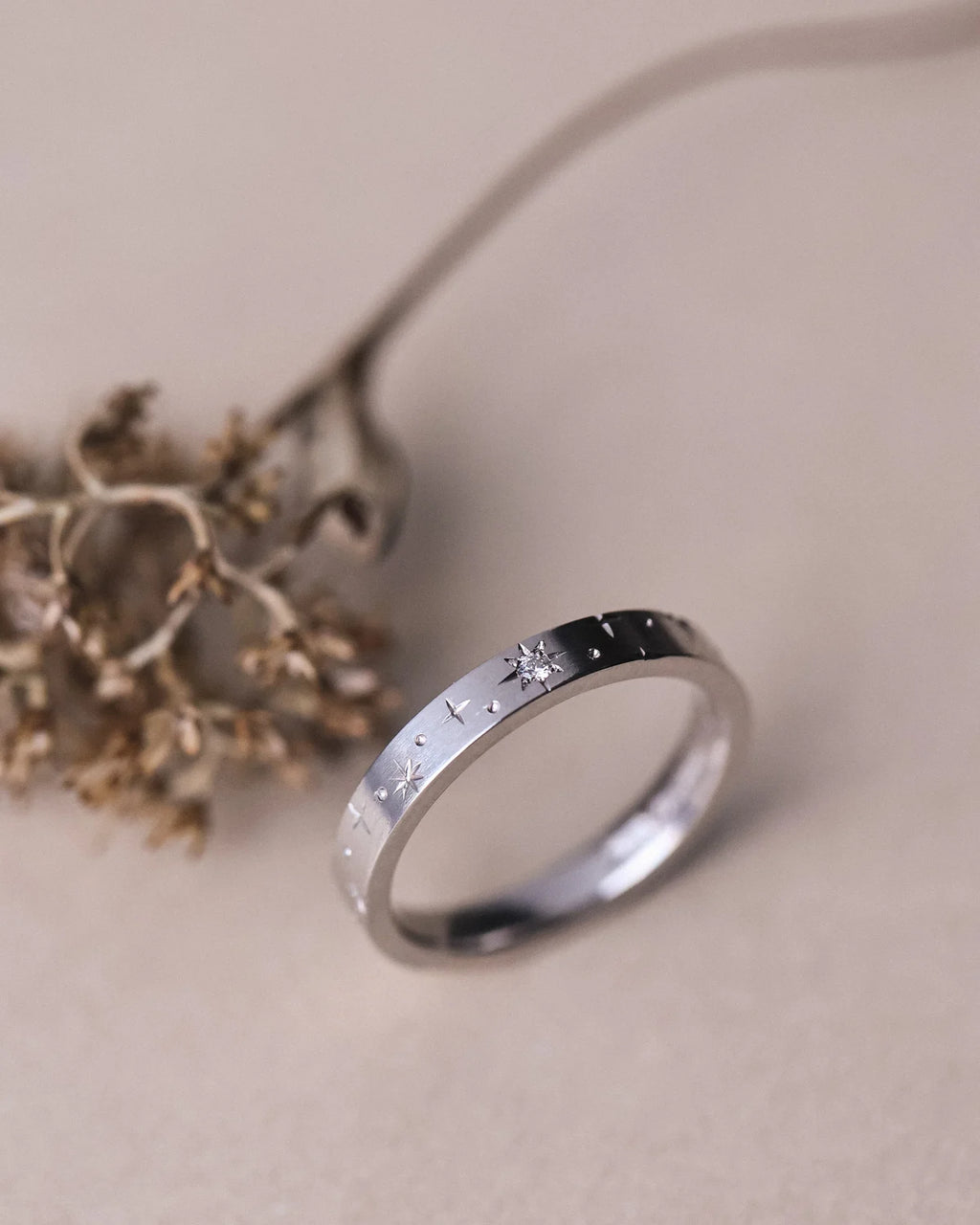 Side view of platinum star set diamond eternity ring