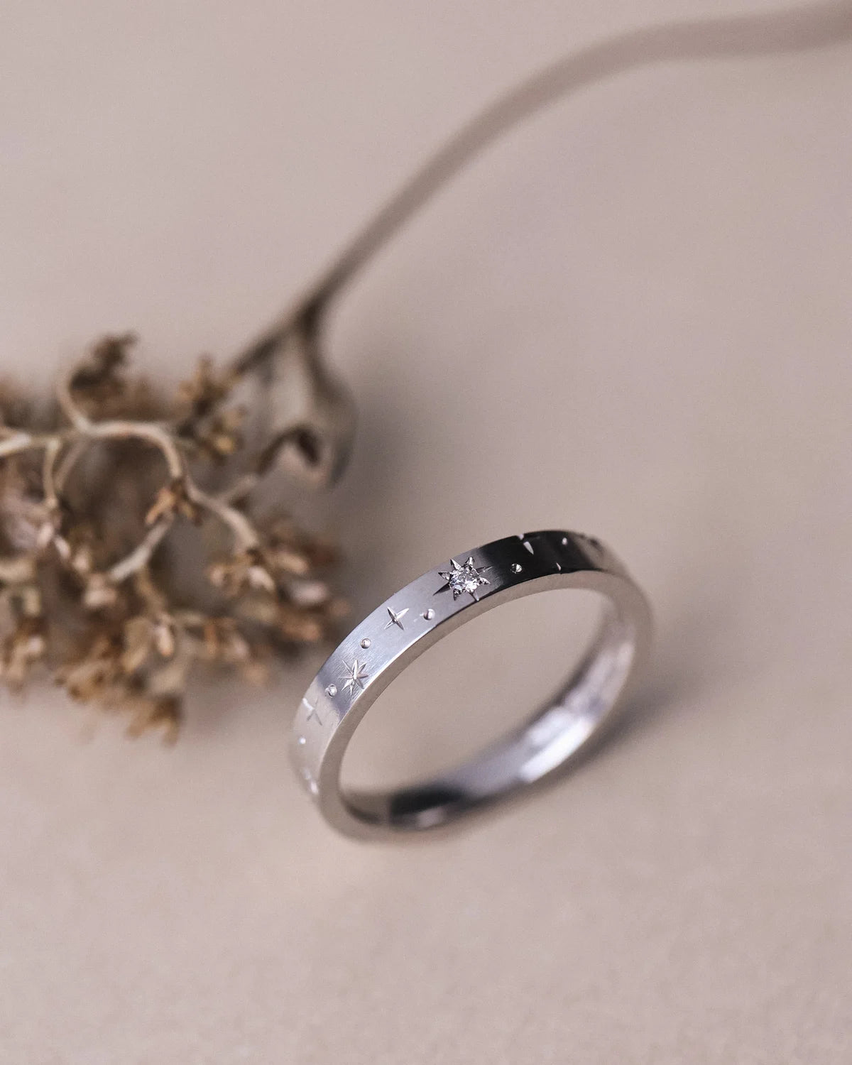 Side view of platinum star set diamond eternity ring