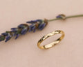 2mm olive leaf engraved wedding ring in 18ct yellow gold