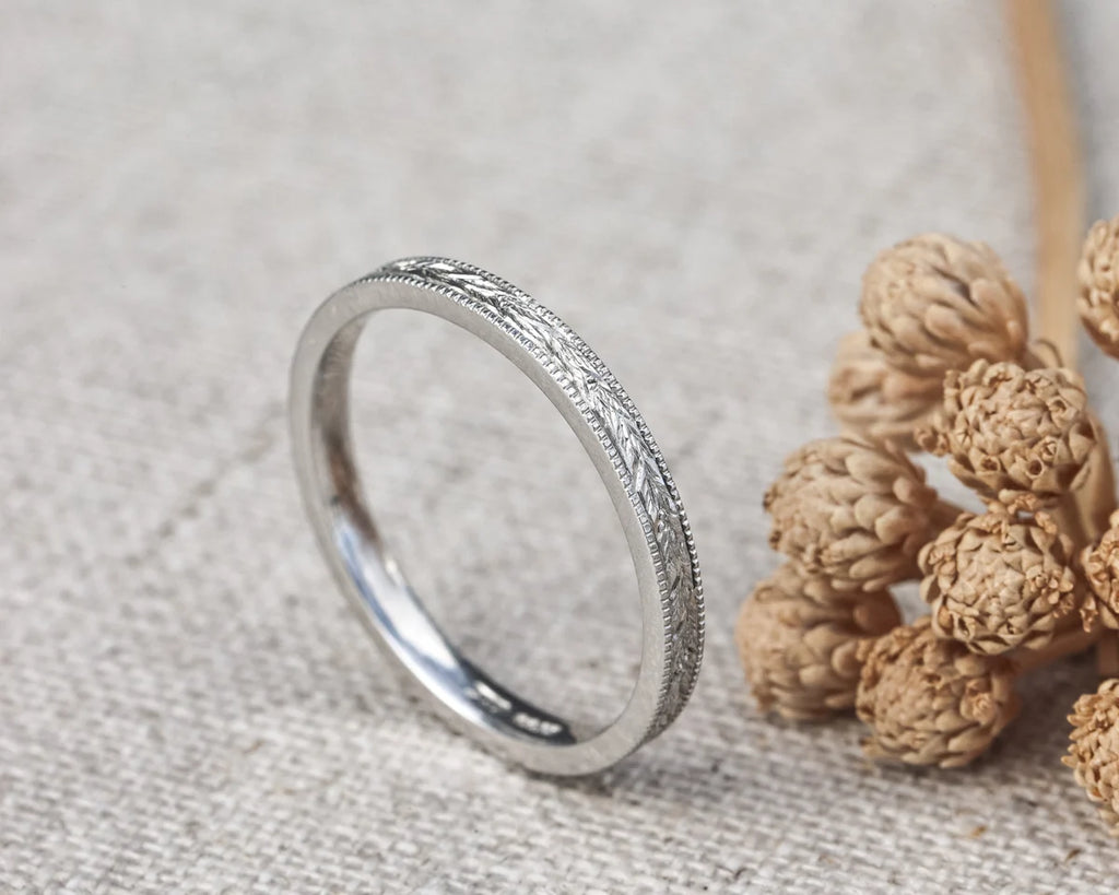 platinum flat court ring 2mm laurel leaf design textured edge band