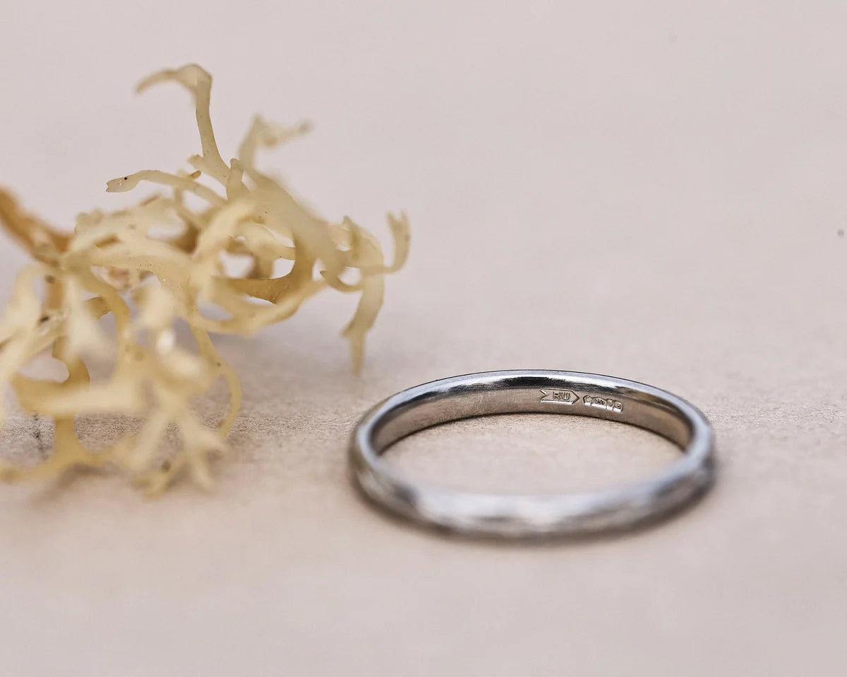 Minimal platinum olive leaf engraved wedding ring with natural styling