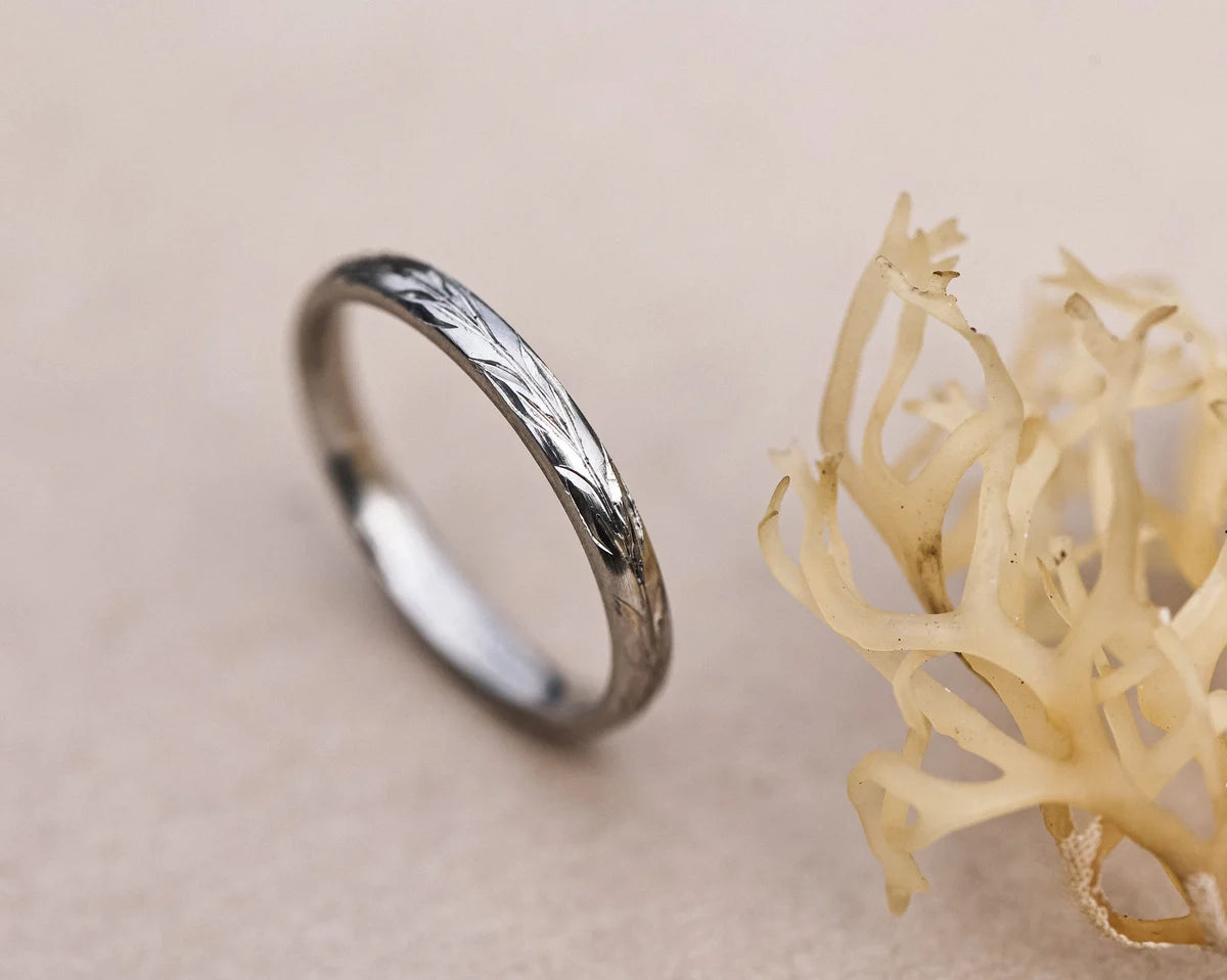 2mm olive leaf engraved wedding ring in platinum