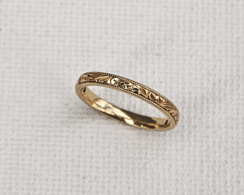 fine gold wedding band 2mm floral leaf design textured edge ring