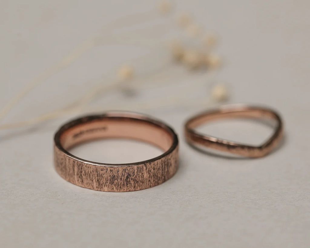 9ct rose gold horn texture ring paired with wishbone wedding band