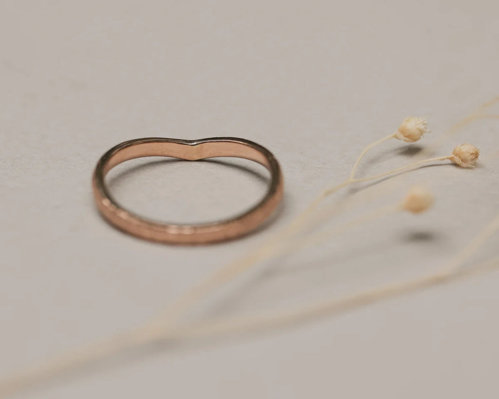 Inside view of 18ct rose gold wishbone ring with hallmark