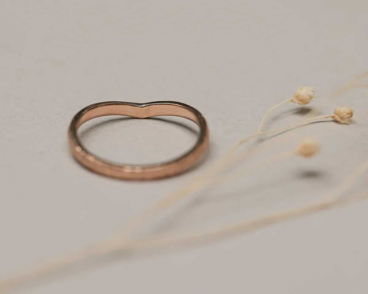 Inside view of 18ct rose gold wishbone ring with hallmark