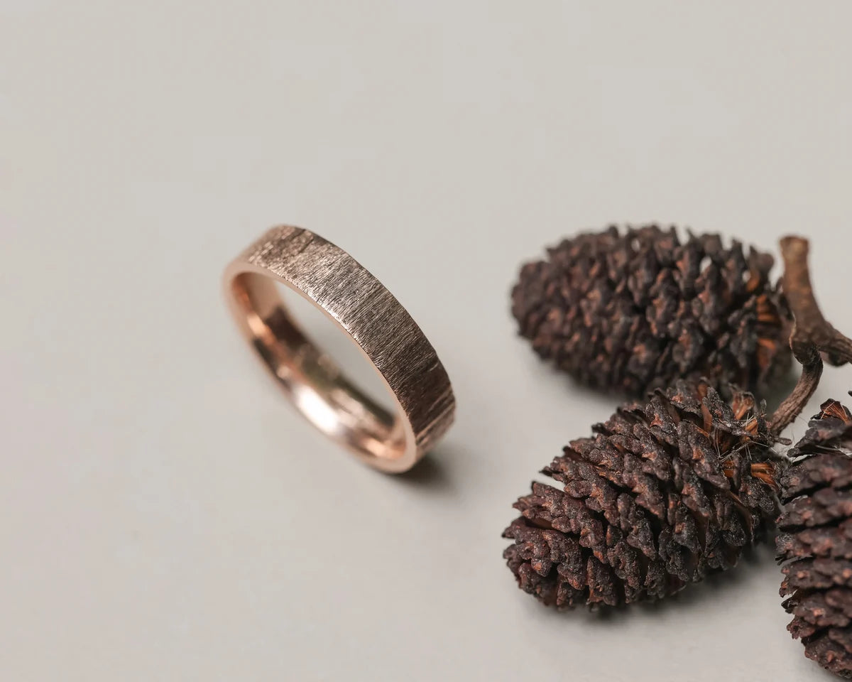 Minimal 9ct rose gold horn texture wedding band with natural styling