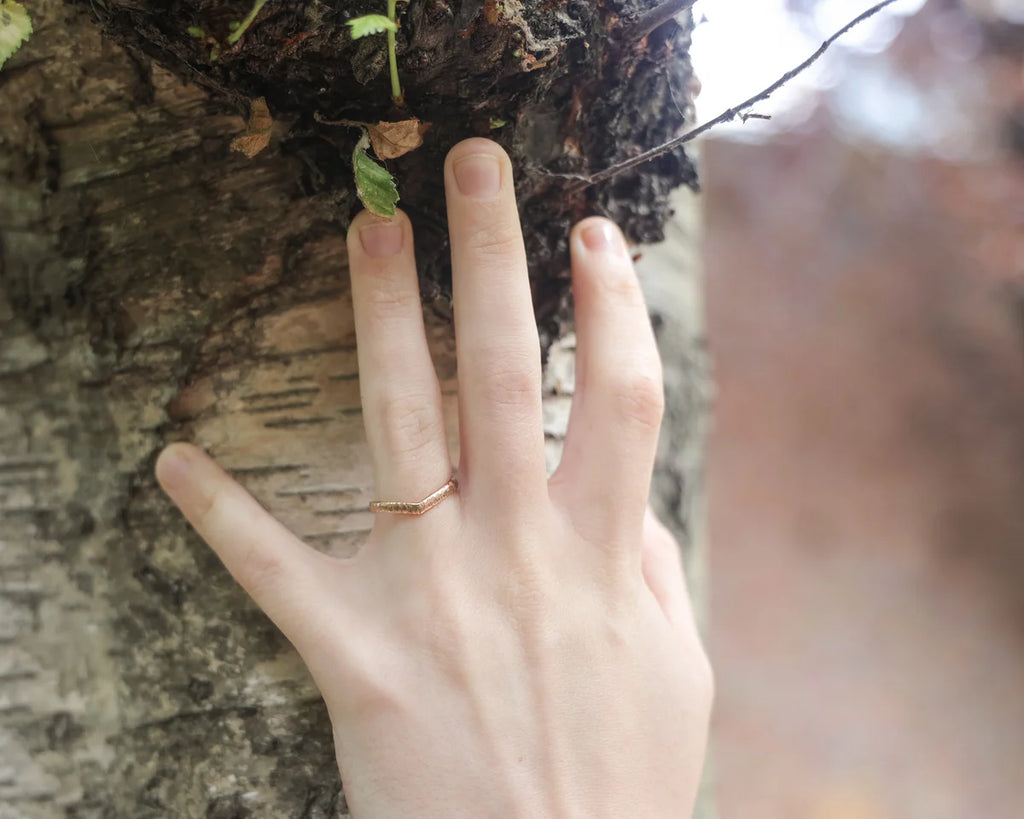 18ct rose gold horn texture wishbone ring worn on hand