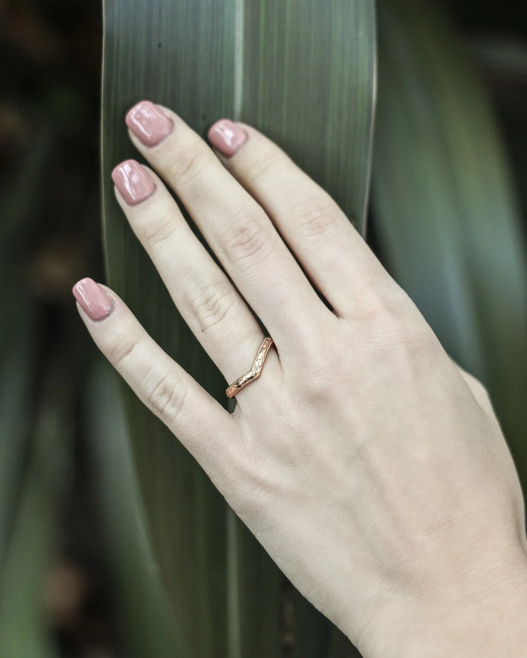 wishbone wedding ring worn with engagement ring 18ct rose gold