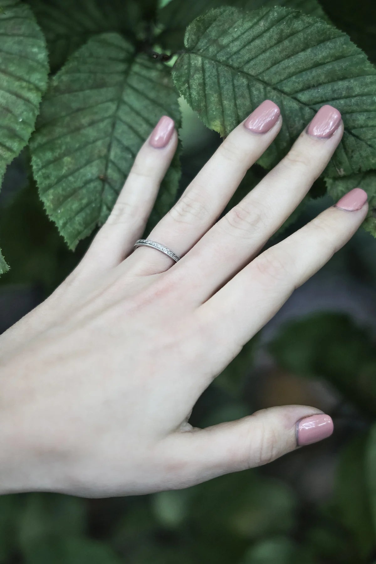 platinum flat band worn on hand minimalist everyday ring