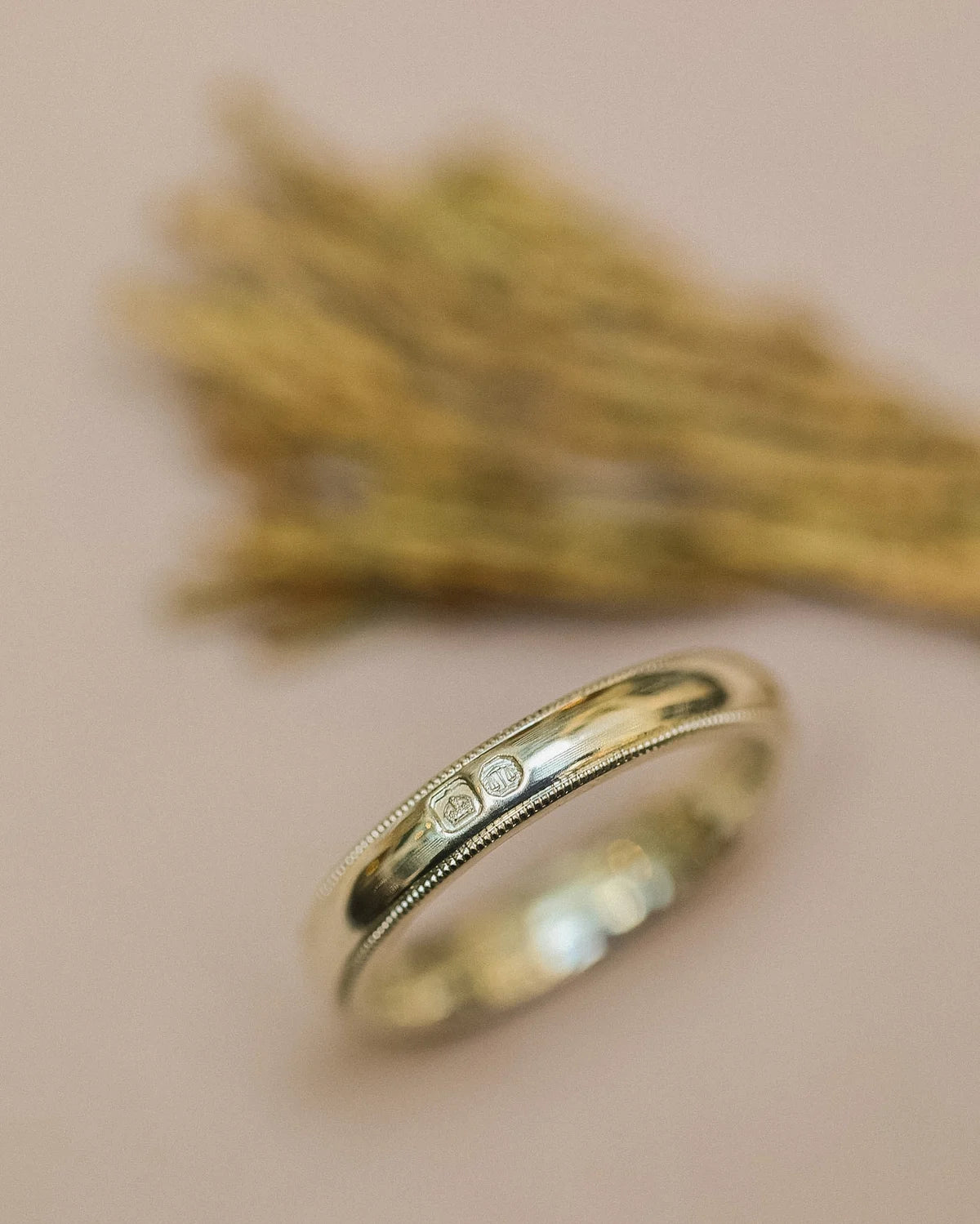 Minimal milled edge wedding ring in 9ct white gold