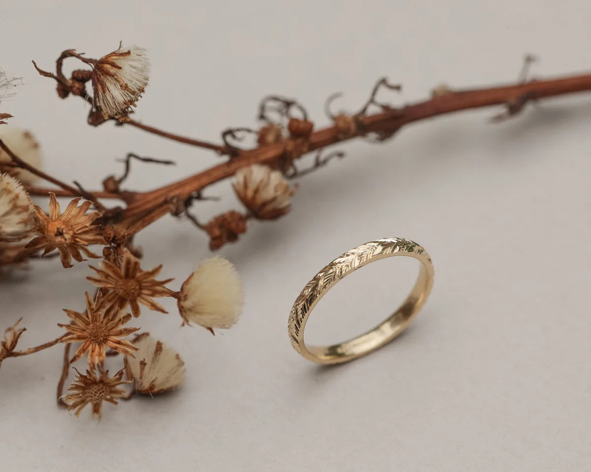 Side view of handmade laurel leaf ring in 18ct yellow gold