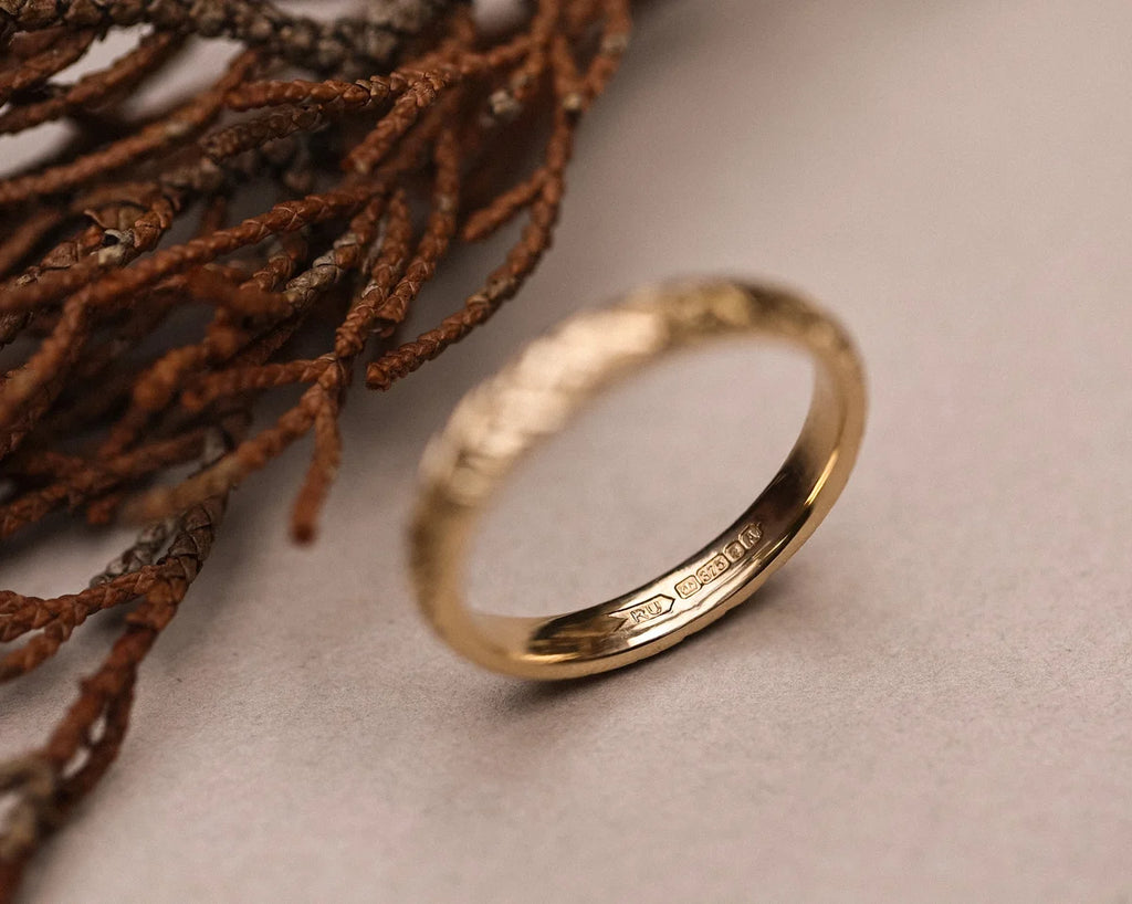 Back view of handmade 9ct gold laurel leaf wedding ring