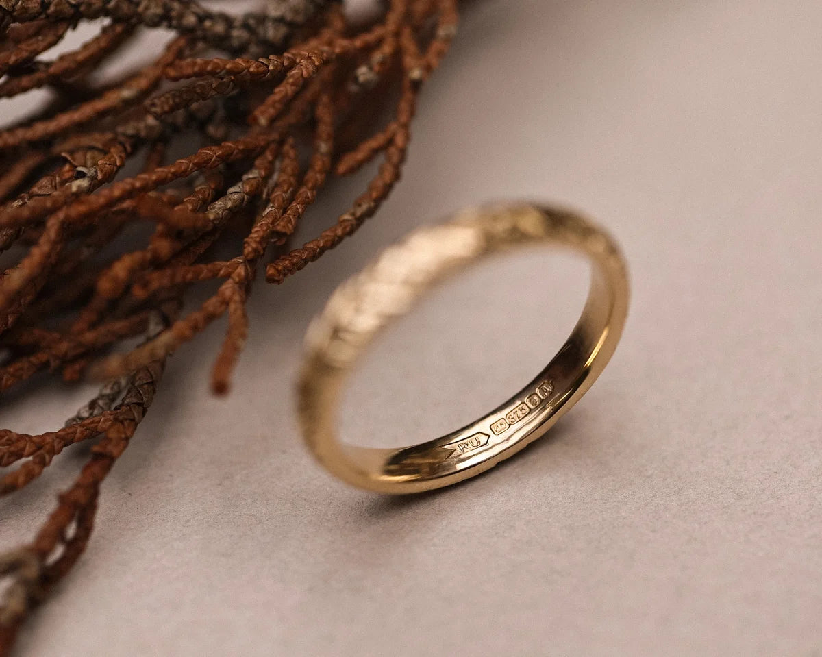 Back view of handmade 9ct gold laurel leaf wedding ring