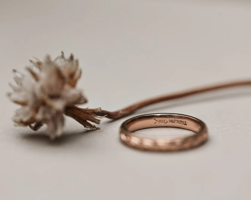 Back view of 18ct rose gold wedding ring with fine milled edge