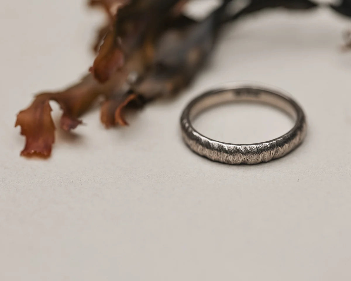 4mm white gold band textured ring side view