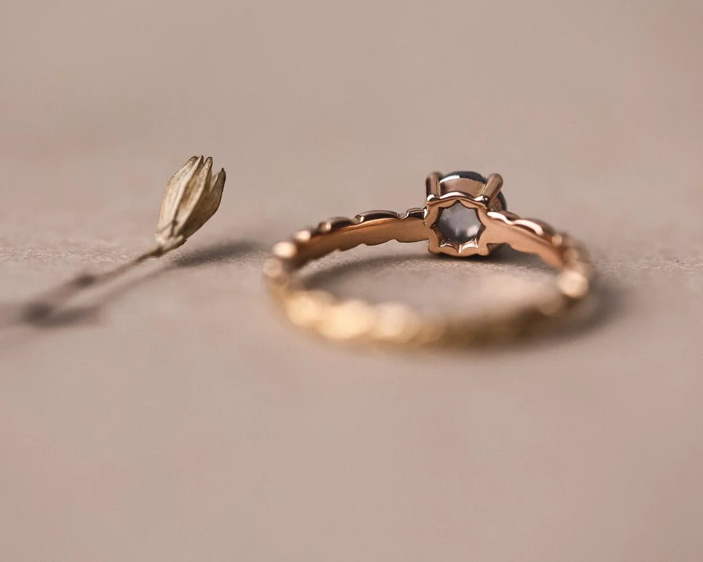 Front view of pale grey rose-cut diamond ring in 18ct rose gold
