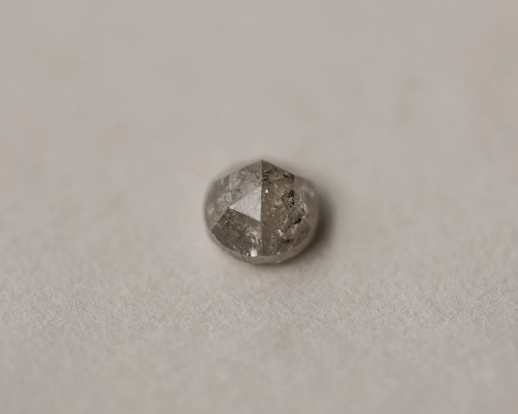 Close-up of natural pale grey rose-cut diamond