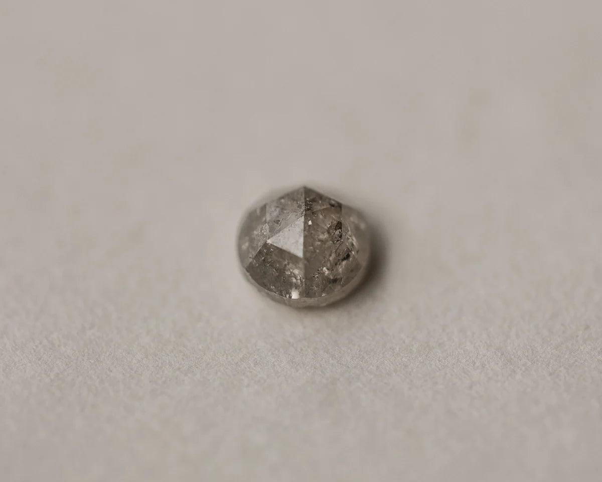 Close-up of natural pale grey rose-cut diamond