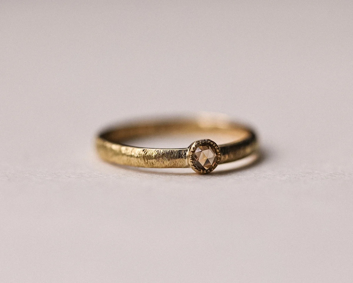 Low front view of champagne rose-cut diamond ring in yellow gold