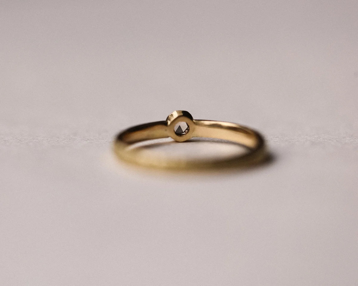 Minimal champagne rose-cut diamond ring with textured yellow gold band