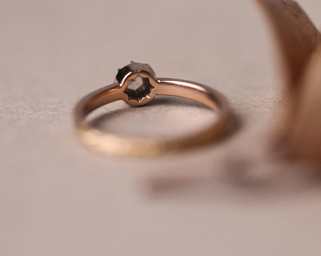 Low front view of rose gold laurel ring with natural brown-grey diamond