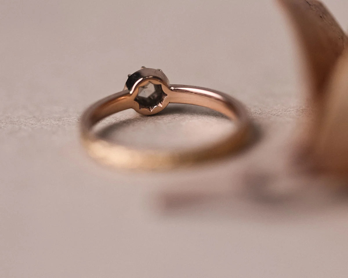Low front view of rose gold laurel ring with natural brown-grey diamond