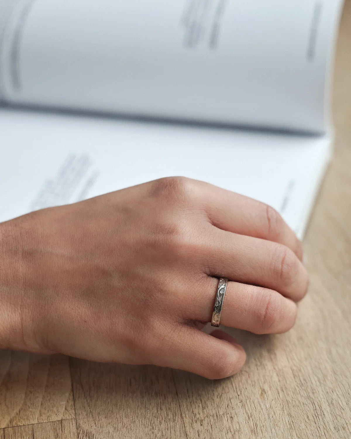 floral engraved ring worn on hand minimalist wedding band