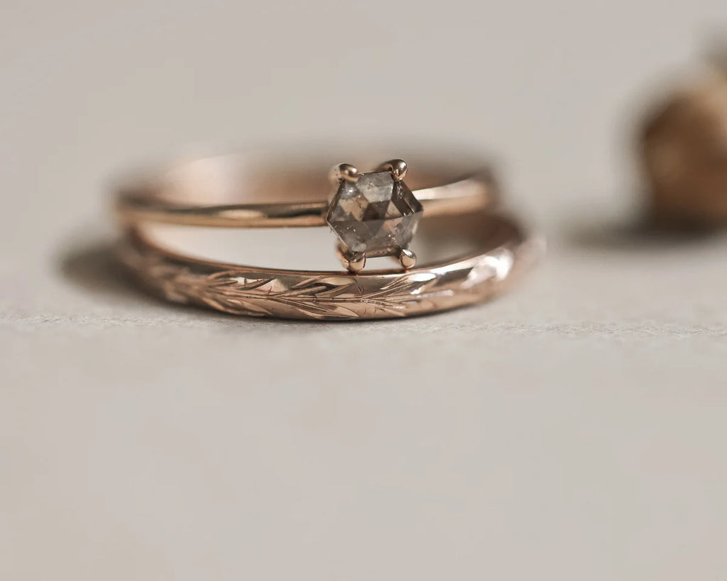 Olive leaf engraved rose gold ring stacked with diamond engagement ring