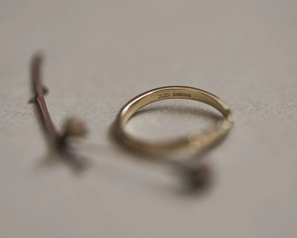 Back view of 18ct yellow gold wishbone ring with smooth interior