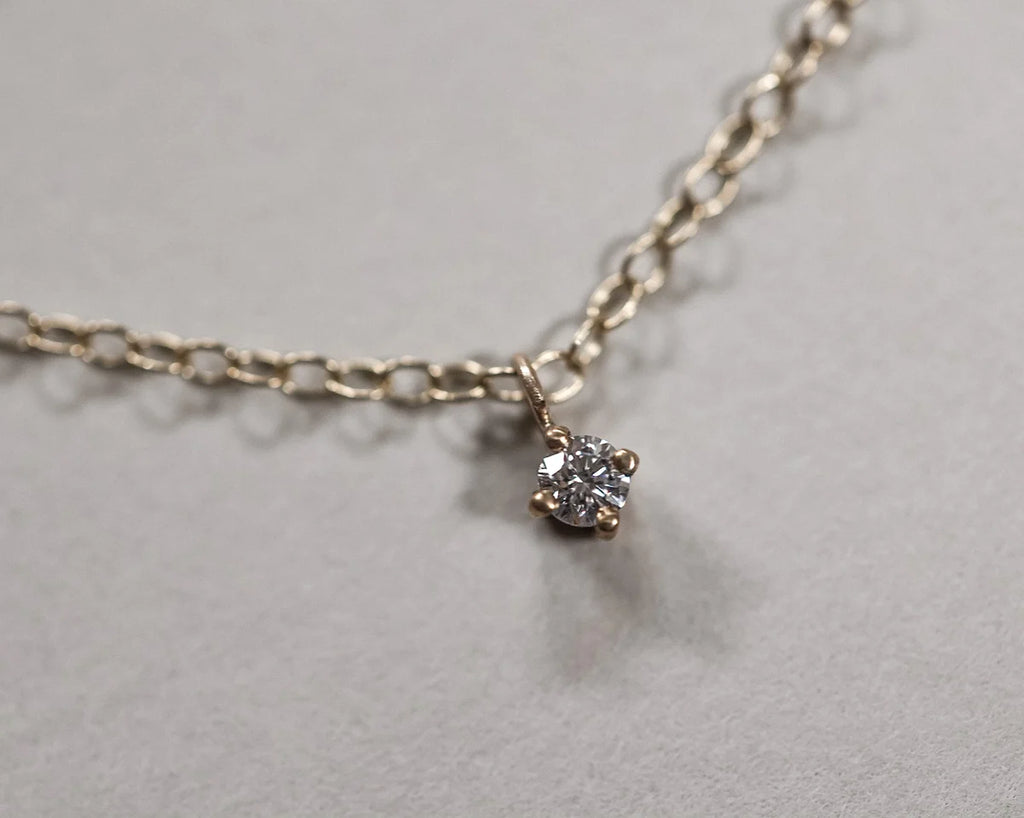 claw setting detail white diamond necklace 9ct gold