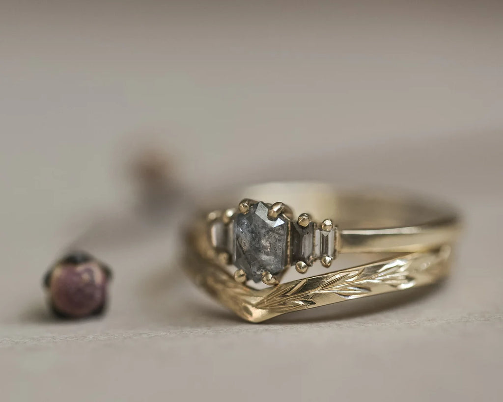Olive leaf engraved wishbone ring stacked with diamond engagement ring