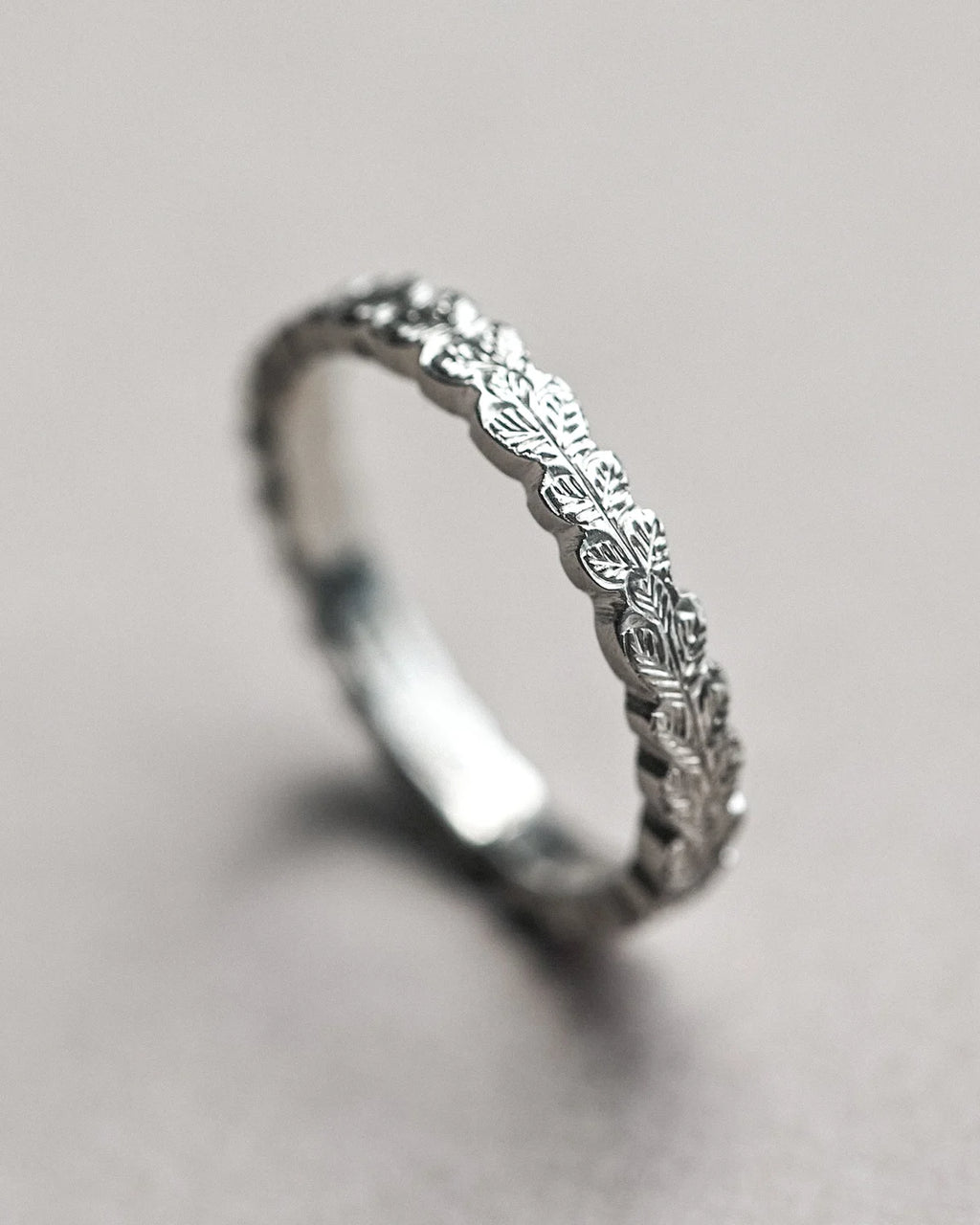 side profile 3mm platinum flat court band carved leaf detail