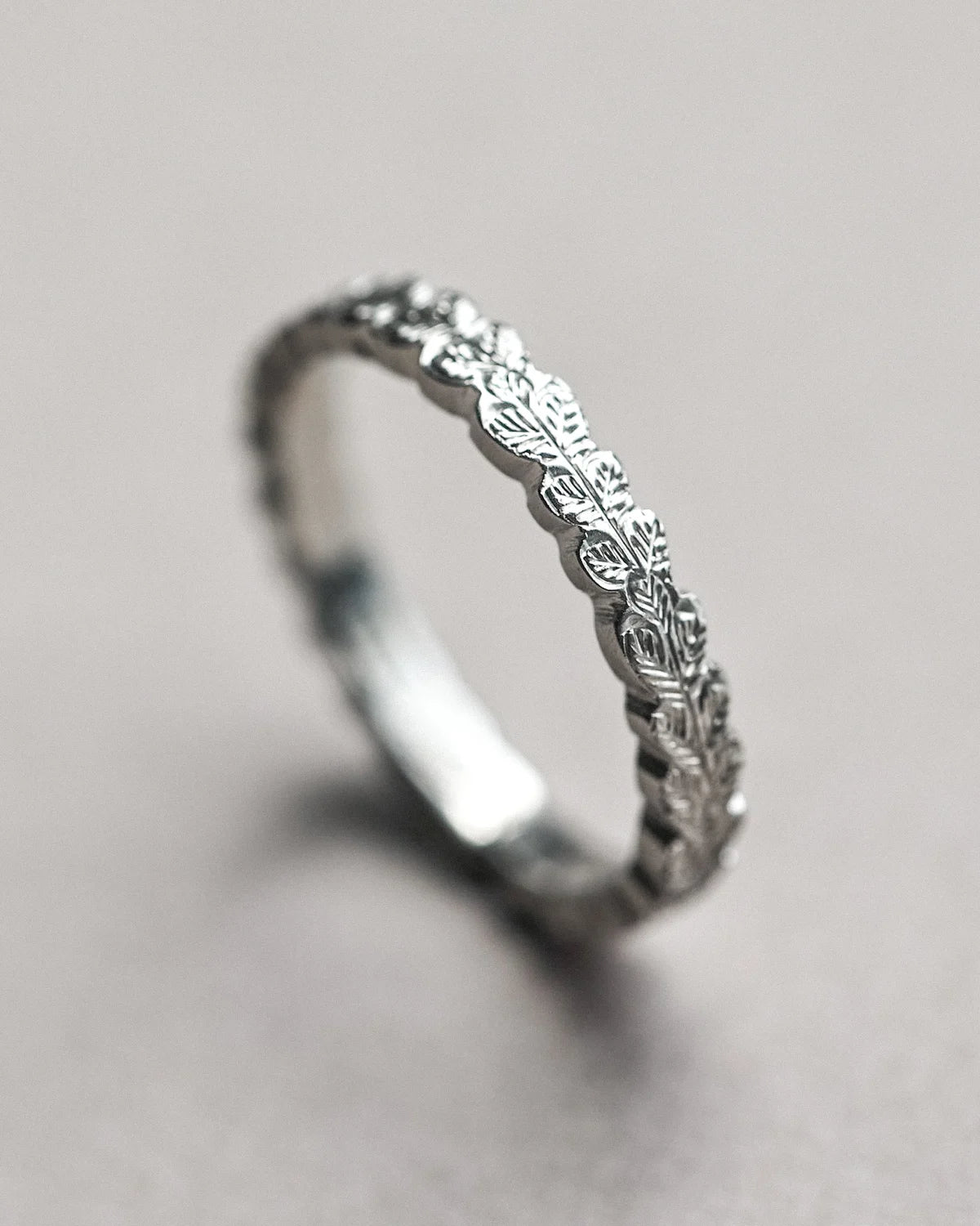 side profile 3mm platinum flat court band carved leaf detail