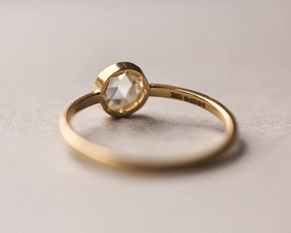 Front view of handmade yellow gold solitaire ring with 5mm rose-cut diamond