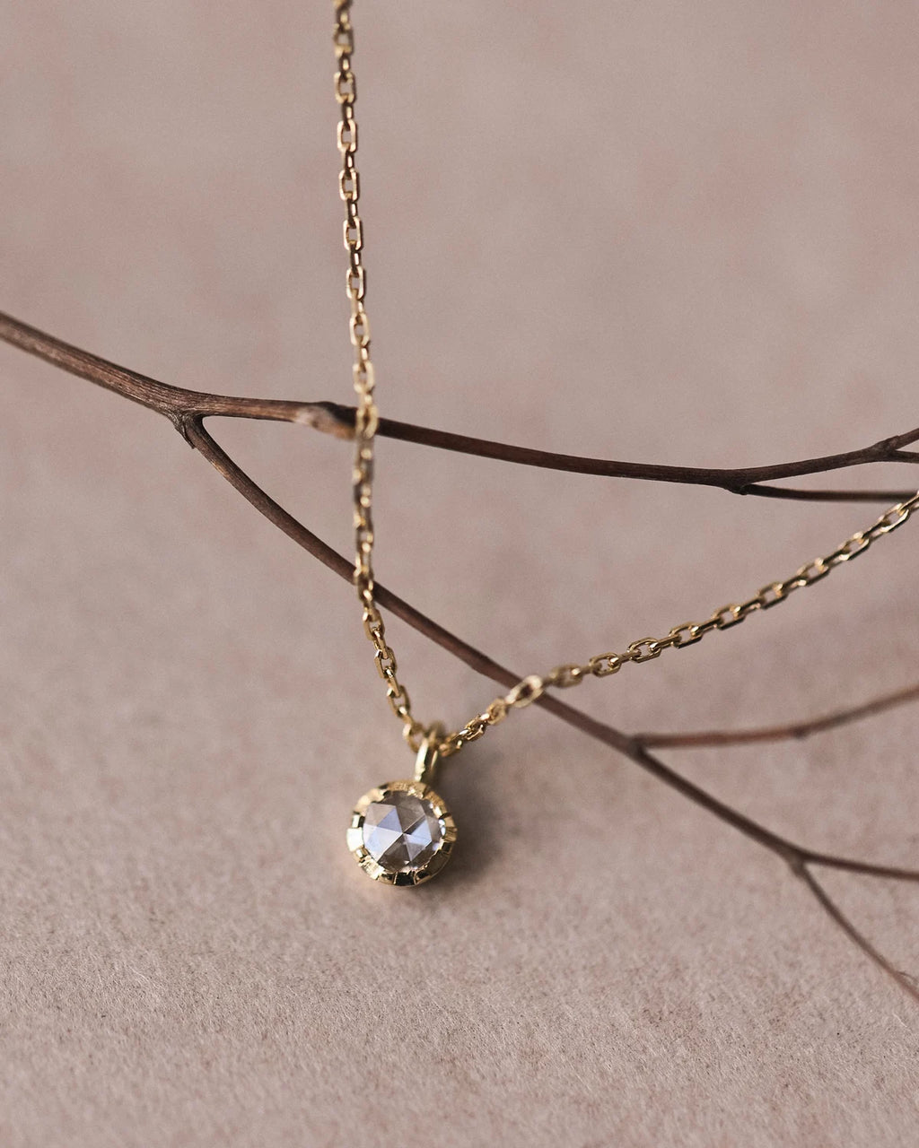 gold chain and diamond pendant
