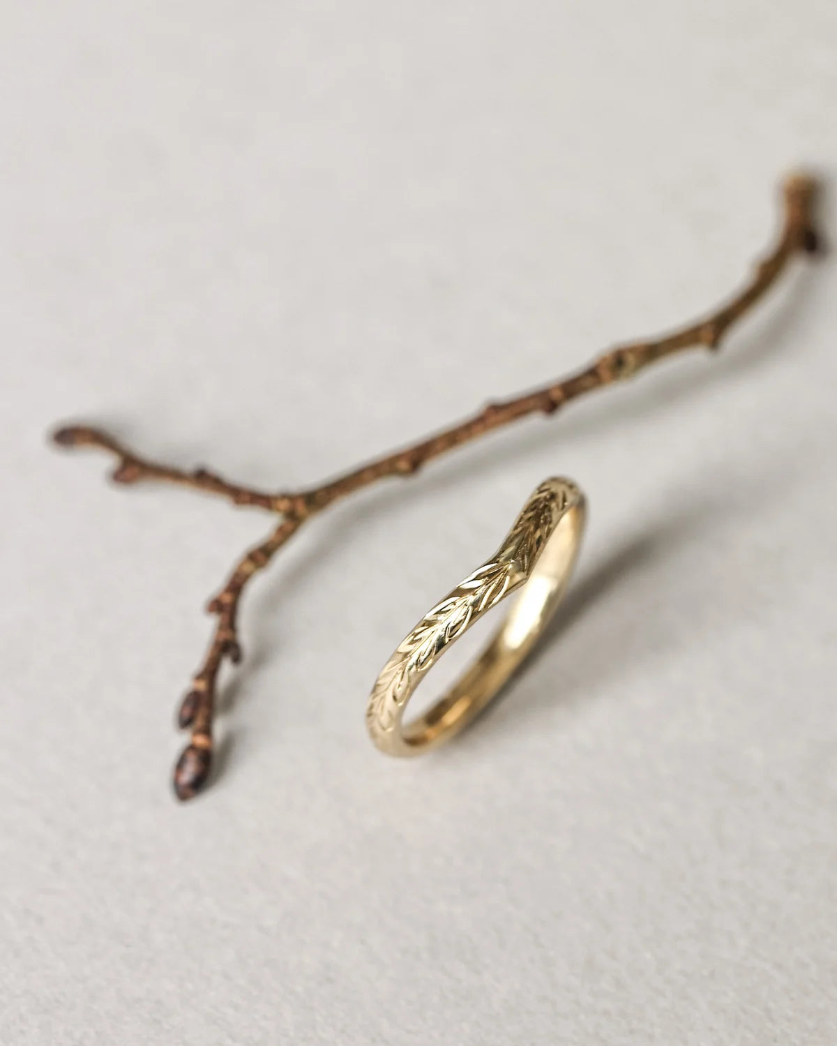 fine gold wishbone wedding ring olive leaf detail