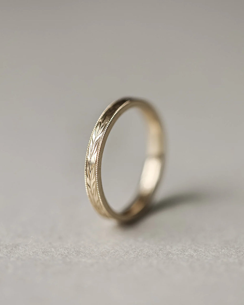 gold band side view olive leaf carving detail